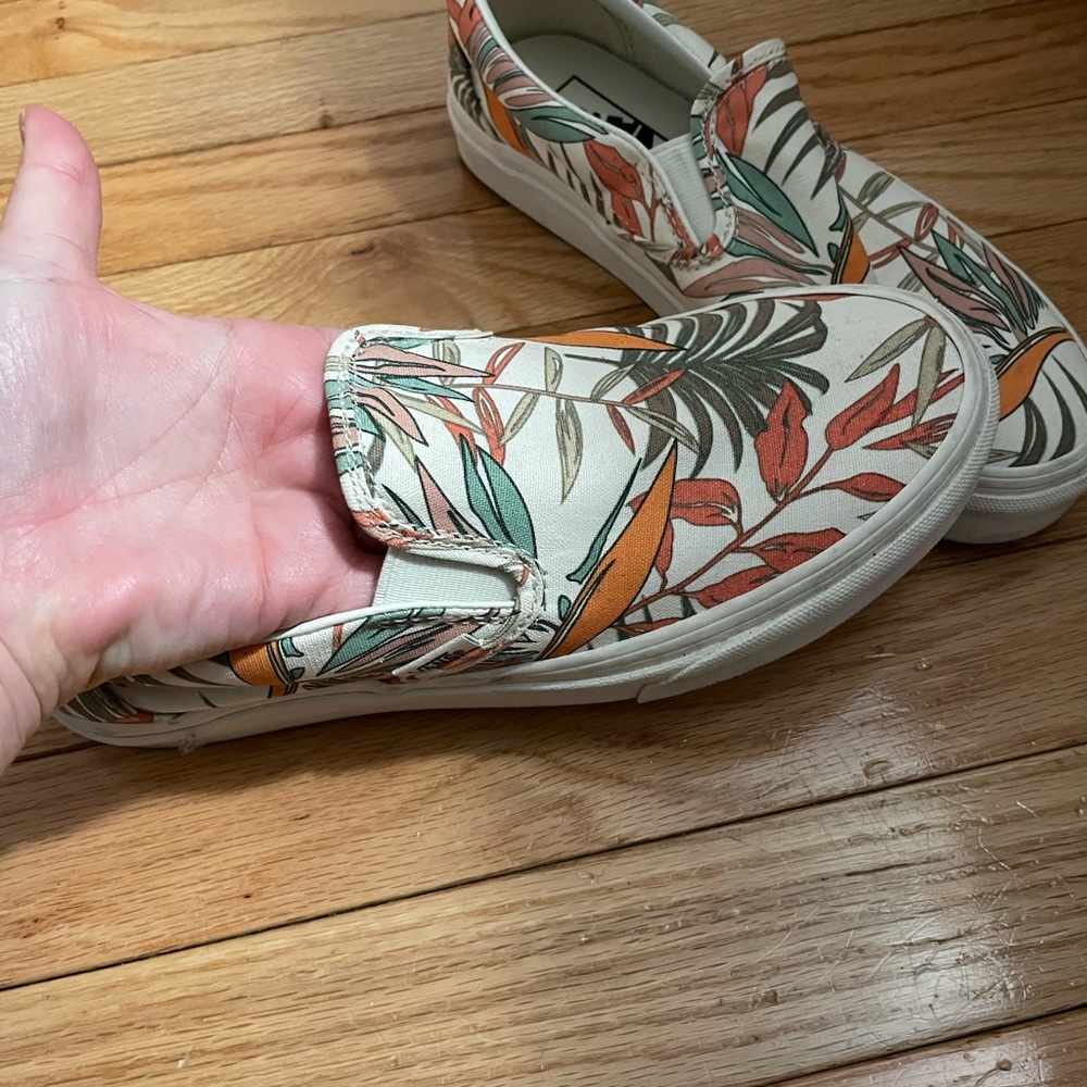 Vans Slip-On Sneakers in Cream with Green and Orange Leaf Print